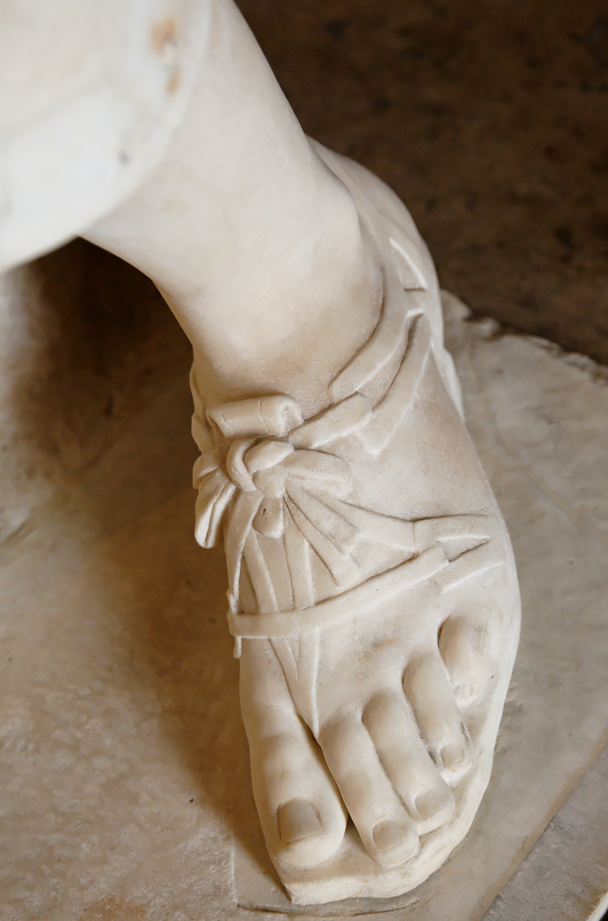 Marble statue detail of a sandaled foot, Artemis of Gabii, Louvre